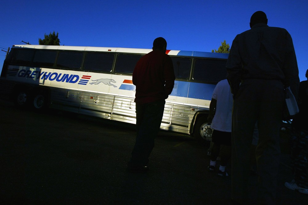 Passengers line up to board a Greyhound bus. (Photo by Spencer Platt/Fortune Magazine/Getty)