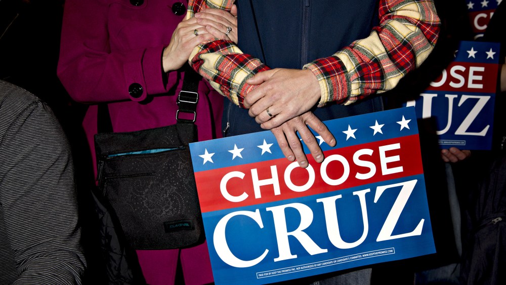 Attendees wait for the start of a campaign rally with Senator Ted Cruz, a Republican from Texas and 2016 presidential candidate, in Green Bay, Wis., April 3, 2016. (Photo by Daniel Acker/Bloomberg/Getty)