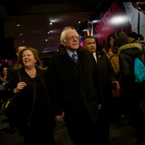 Democratic presidential candidate Sen. Bernie Sanders (D-VT) and his wife, Jane Sanders, walk through the Theatre District in Times Square, April 8, 2016 in New York City. (Photo by Eric Thayer/Getty)