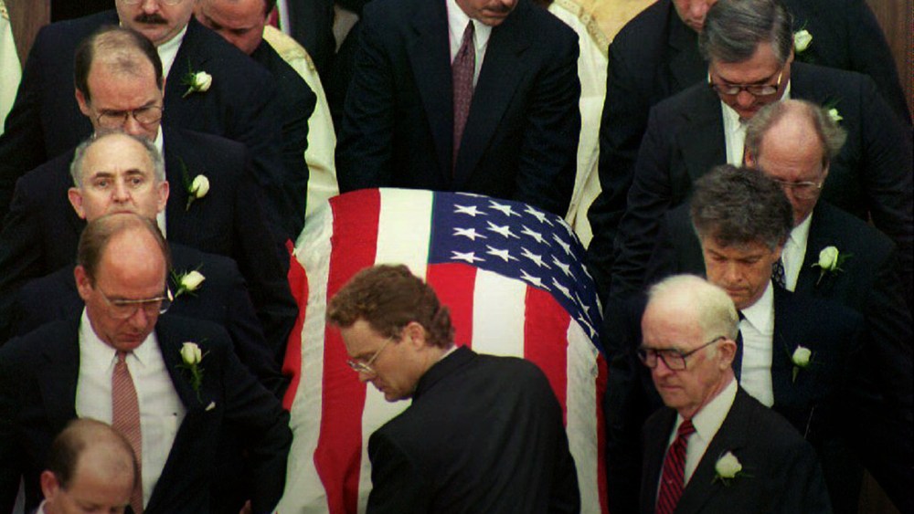 Pallbearers remove the casket of deputy White House counsel Vince Foster Jr. after funeral services at St. Andrews Catholic Cathedral in Little Rock, Ark., July 23, 1993. (Photo by Bob Ochen/AFP/Getty)