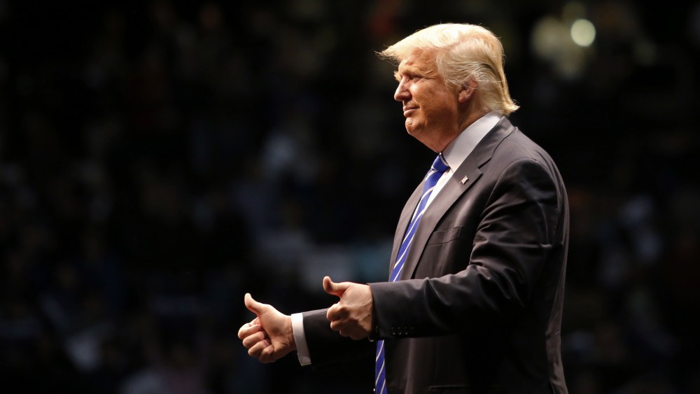 Republican presidential candidate Donald Trump greets supporters after speaking at a campaign rally on April 11, 2016 in Albany, New York. (Photo by Eduardo Munoz Alvarez/Getty)