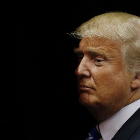 Republican presidential candidate Donald Trump exits the arena after speaking at a campaign rally on April 11, 2016 in Albany, New York. (Photo by Eduardo Munoz Alvarez/Getty)