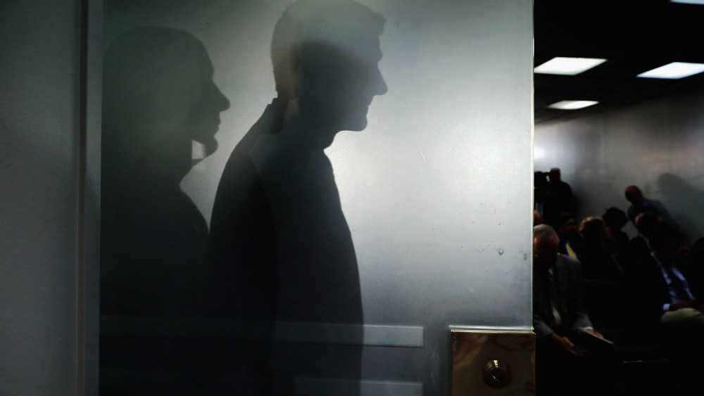Speaker of the House Paul Ryan (R-WI) casts his shadow on a glass door as he arrives for a news conference following the weekly House Republican conference at the U.S. Capitol April 13, 2016 in Washington, DC. (Photo by Chip Somodevilla/Getty)
