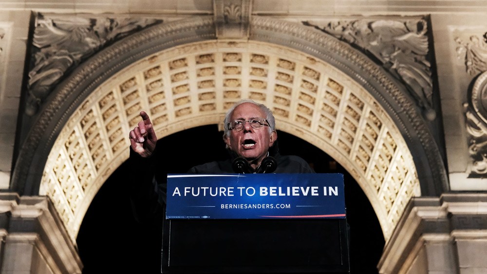 Democratic Presidential candidate Bernie Sanders speaks under the arch at historic Washington Square Park to thousands of people at a rally on April 13, 2016 in New York City. (Photo by Spencer Platt/Getty)