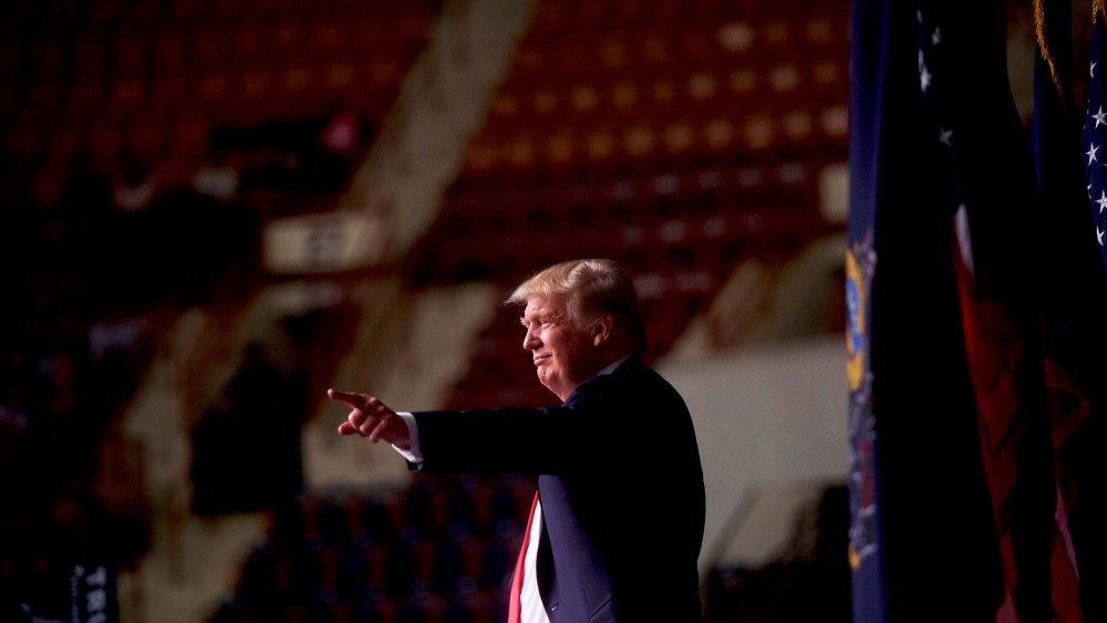 Republican presidential hopeful Donald Trump points to supporters following a rally at the Pennsylvania Farm Show Complex & Expo Center on April 21, 2016 in Harrisburg, Penn. (Photo by Mark Makela/Getty)