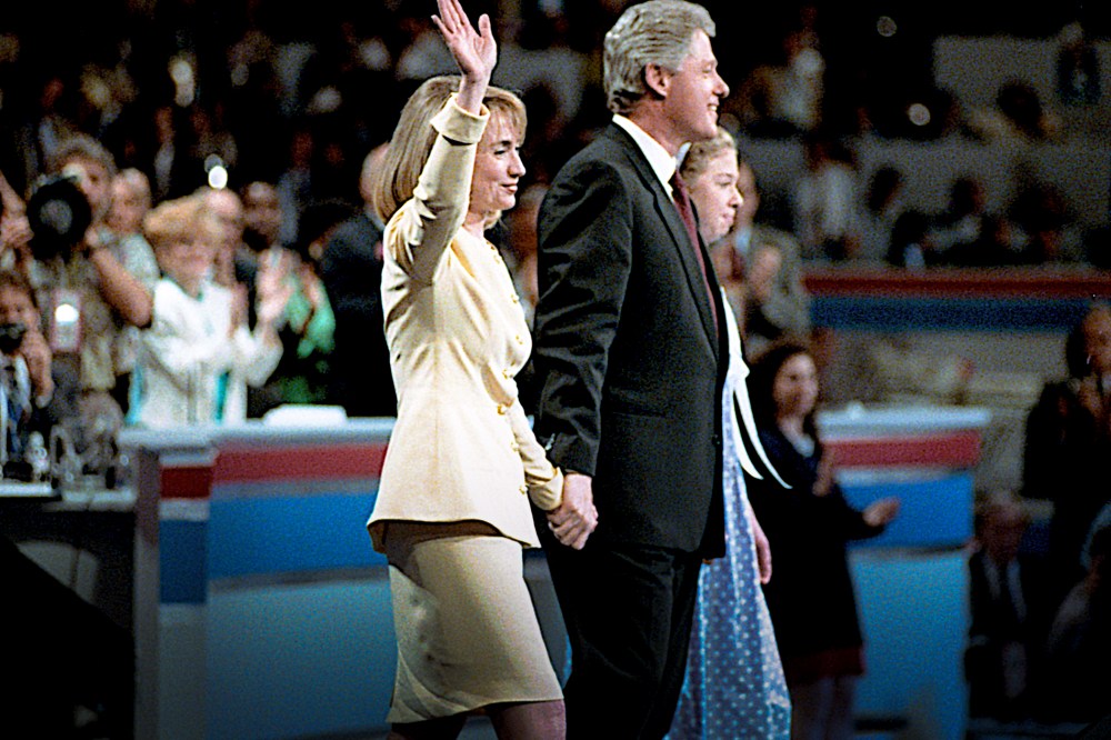 Former Gov. Bill Clinton introduces his wife Hillary and daughter Chelsea to the 1992 Democratic National Convention in New York, NY. (Photo by Mark Reinstein/Corbis/Getty)