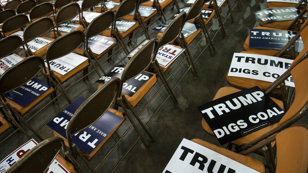 Campaign signs are seen before a rally for Republican Presidential hopeful Donald Trump in Charleston, W. Va., on May 5, 2016. (Photo by Brendan Smialowski/AFP/Getty)