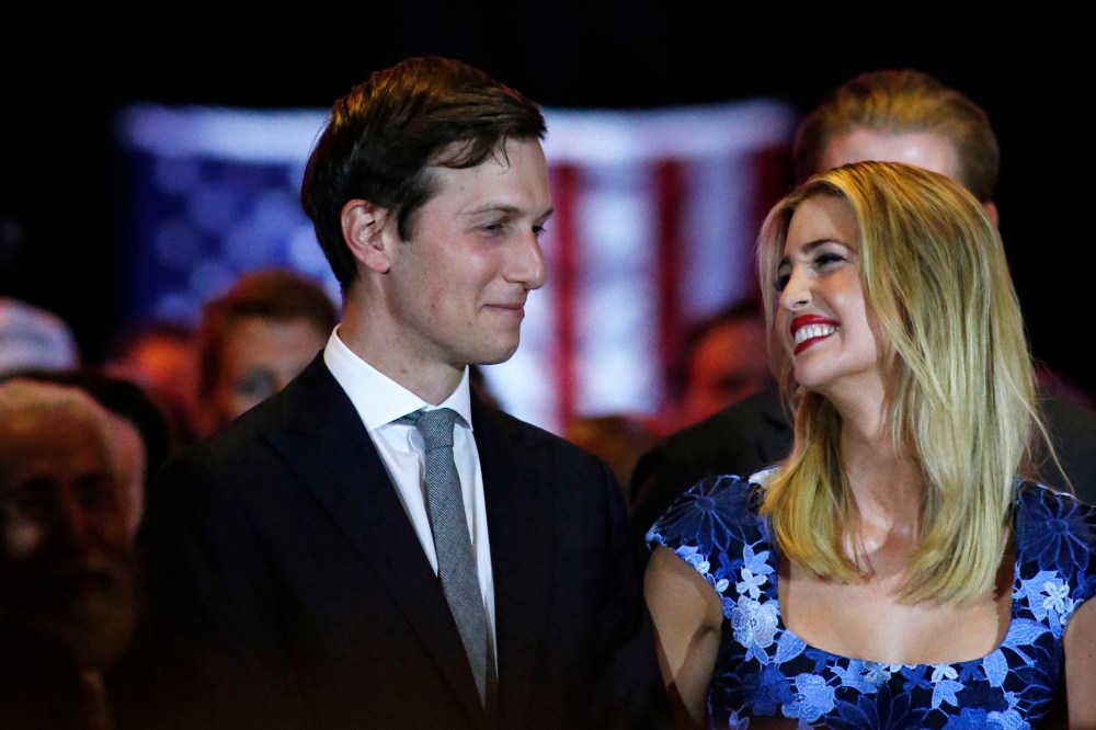 Ivanka Trump smiles at her her husband, Jared Kushner (L), as her father Republican presidential front runner Donald Trump speaks to supporters and the media on May 3, 2016 in New York, N.Y. (Photo by View press/Corbis/Getty)