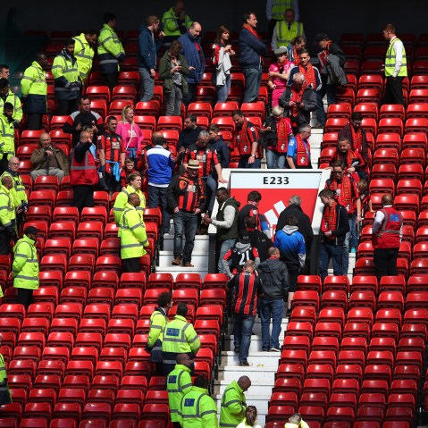 Fans are evacuated from the ground as the match is abandoned ahead of the Barclays Premier League match between Manchester United and AFC Bournemouth at Old Trafford on May 15, 2016 in Manchester, England. (Photo by Alex Livesey/Getty)