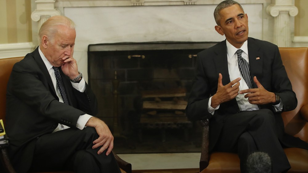 President Obama is flanked by Vice President Biden as he speaks to the media about the Zika virus, after receiving a briefing from his public health team in the Oval Office at the White House, May 20, 2016 in Washington, DC. (Photo by Mark Wilson/Getty)