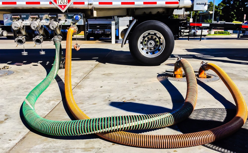 A gasoline tanker distributes gasoline to underground gasoline tanks in Venice, Calif., Jan. 24, 2015. (Photo by  Bob Berg/Getty)