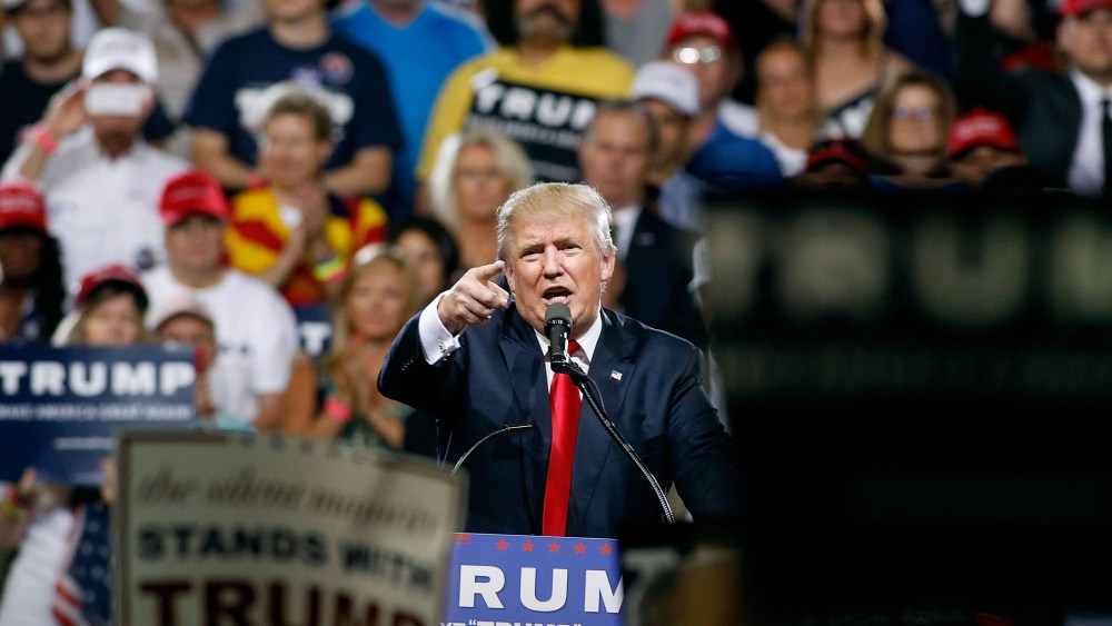 Republican presidential candidate Donald Trump speaks to a crowd of supporters during a campaign rally on June 18, 2016 in Phoenix, Ariz. (Photo by Ralph Freso/Getty)