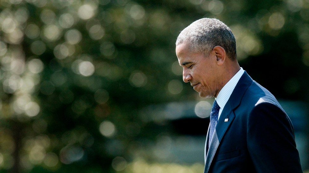 President Barack Obama walks across the South Lawn to board Marine One as he departs the White House, on Sept. 13 2016, in Washington, D.C. (Photo by Olivier Douliery/AFP/Getty)
