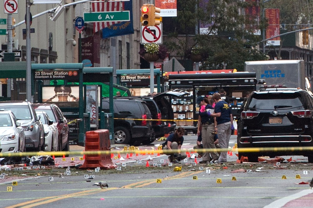 FBI agents review the crime scene of remnants of bomb debris on 23rd St. in Manhattan's Chelsea neighborhood on Sept. 18, 2016 in New York City. (Photo by Stephanie Keith/Getty)