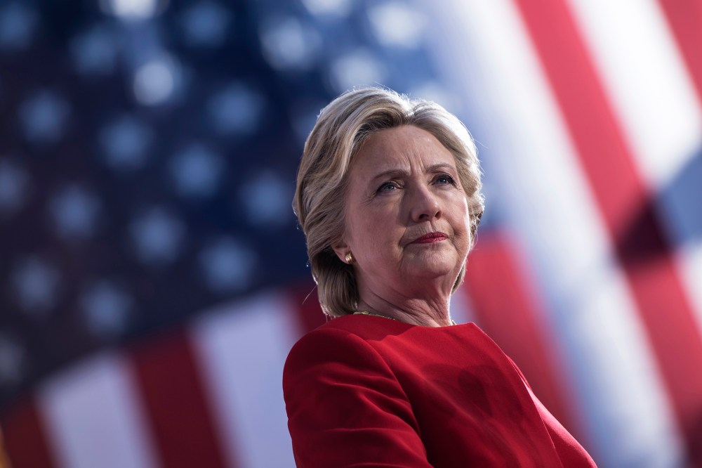 Democratic presidential nominee Hillary Clinton speaks during a rally outside the University of Pittsburgh's Cathedral of Learning on Nov. 7, 2016 in Pittsburgh, Pa. (Photo by Brendan Smialowski/AFP/Getty)