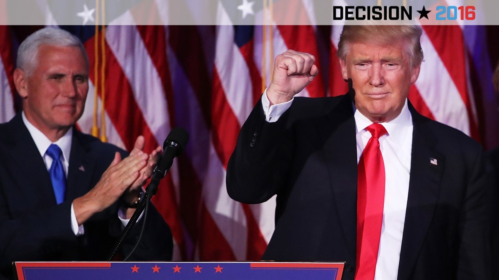 Republican president-elect Donald Trump acknowledges the crowd as Vice president-elect Mike Pence looks on during his election night event at the New York Hilton Midtown, Nov. 9, 2016. (Photo by Mark Wilson/Getty)