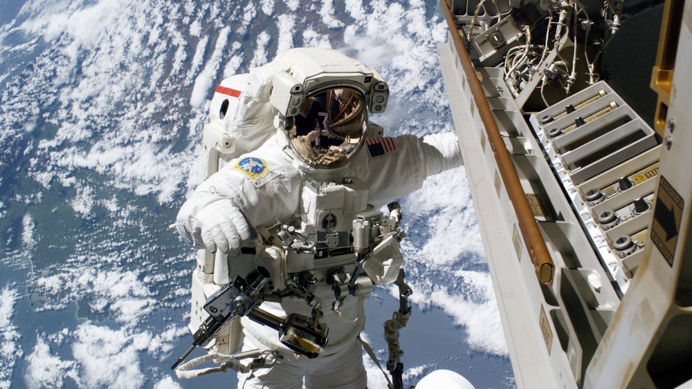 Robert L. Curbeam, Jr., is pictured on the exterior of the International Space Station (Photo by NASA/Getty)