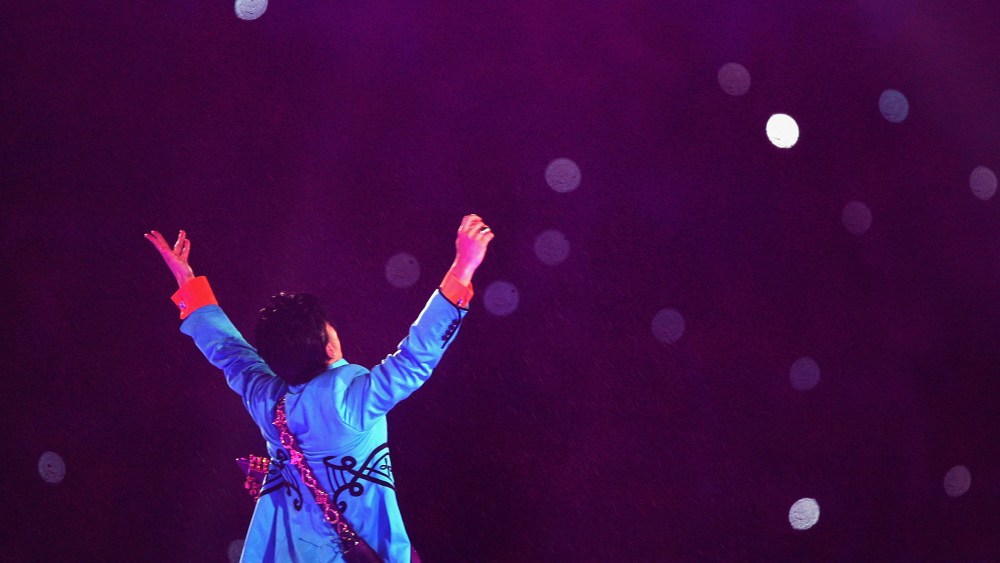 Musician Prince performs during the "Pepsi Halftime Show" at Super Bowl XLI between the Indianapolis Colts and the Chicago Bears on Feb. 4, 2007 at Dolphin Stadium in Miami Gardens, Fla. (Photo by Jed Jacobsohn/Getty)