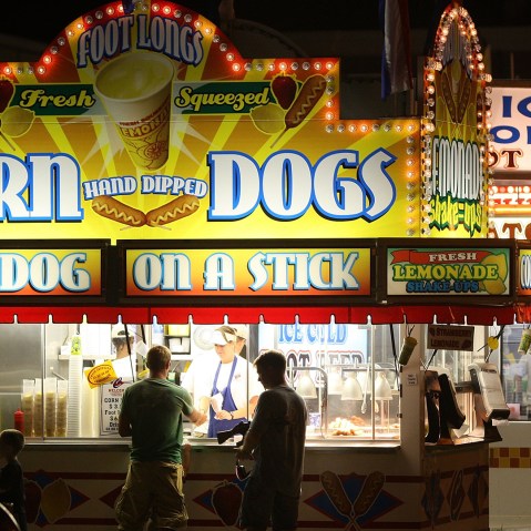 Fairgoers buy food at the Iowa State Fair August 15, 2007 in Des Moines. Iowa. (Photo by Scott Olson/Getty)