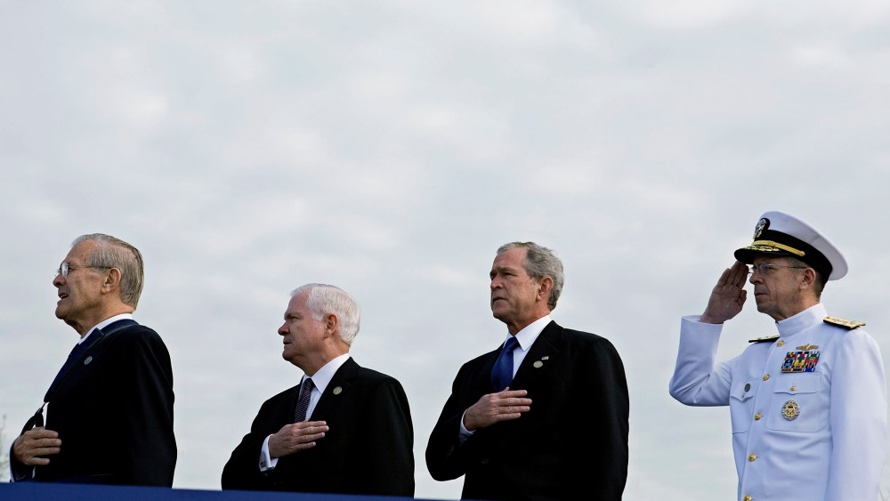 Former U.S. Secretary of Defense, Donald Rumsfeld, U.S. Secretary of Defense Robert Gates, U.S. President George W. Bush and Chairman of the Joint Chiefs of Staff Michael Mullen at the Pentagon Memorial, Sept. 11, 2008. (Photo by Joshua Roberts/Getty)