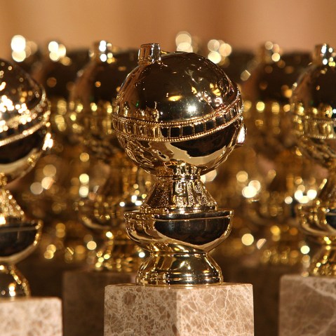 Golden Globe statuettes are on seen on display. (Photo by Frazer Harrison/Getty)