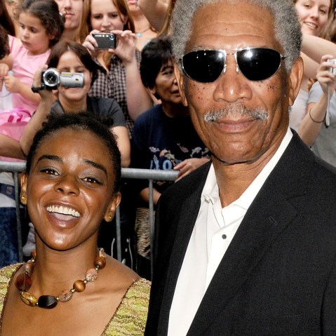 Actor Morgan Freeman and goddaughter E'Dena Hines arrive at "The Dark Knight" premiere at the AMC Loews Lincoln Square theater on July 14, 2008 in New York City. (Photo by Gregg DeGuire/WireImage/Getty)