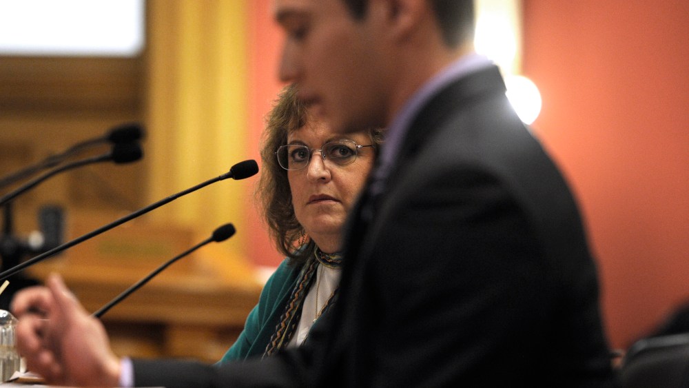 Colorado State Senator Evie Hudak, D-Westminster, left, listens to testimony in the Colorado State Senate in Denver on March 4, 2013.
