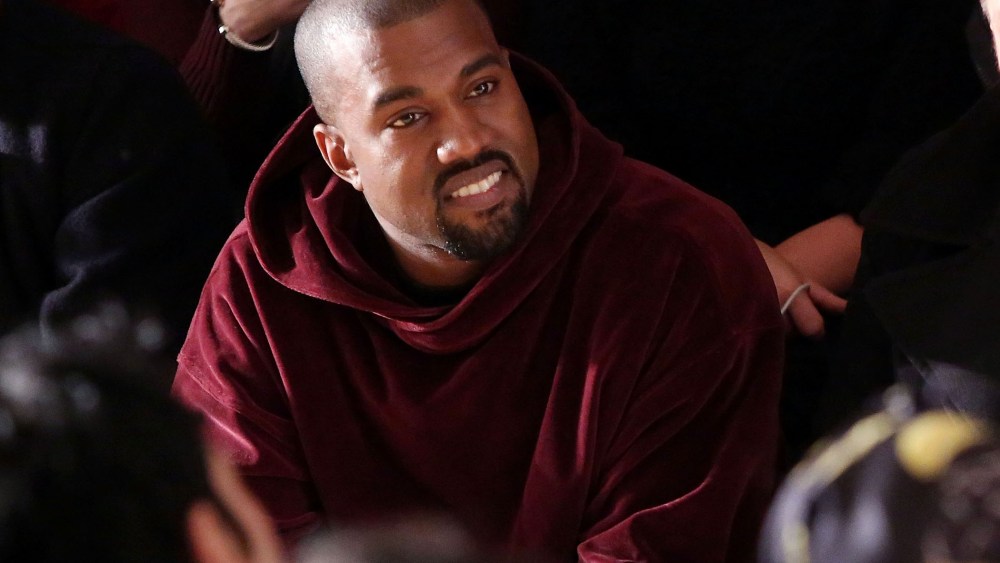 Kanye West watches the Jeremy Scott fall 2015 fashion show at Milk Studios on Feb. 18, 2015 in New York City. (Photo by Taylor Hill/FilmMagic/Getty)
