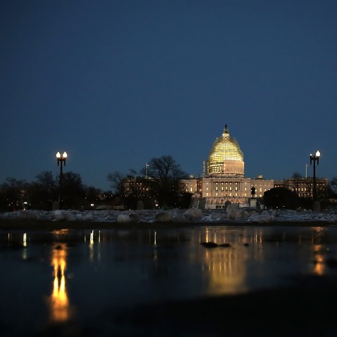 The US Capitol is seen at dusk as the US Congress struggles to find a solution to fund the Department of Homeland Security on Feb. 27, 2015 in Washington, DC. (Photo by Win McNamee/Getty)