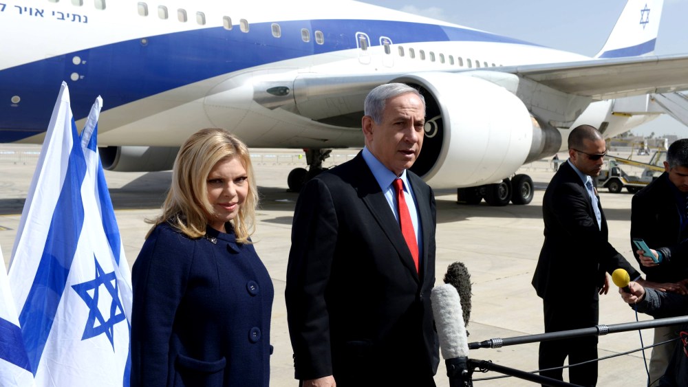 Israeli Prime Minister Benjamin Netanyahu and his wife Sarah Netanyahu depart from Ben Gurion Airport on March 1, 2015. Netanyahu will visit Washington on March 3 to attend US congress. (Photo by Israeli Prime Ministry Press Office/Anadolu Agency/Getty)