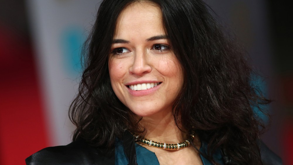 Actress Michelle Rodriguez arrives on the red carpet for the BAFTA British Academy Film Awards at the Royal Opera House in London on Feb. 16, 2014. (Photo by Andrew Cowie/AFP/Getty)