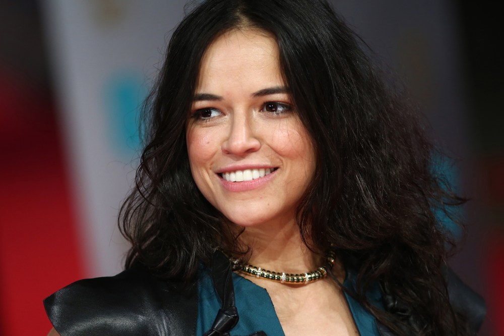 Actress Michelle Rodriguez arrives on the red carpet for the BAFTA British Academy Film Awards at the Royal Opera House in London on Feb. 16, 2014. (Photo by Andrew Cowie/AFP/Getty)
