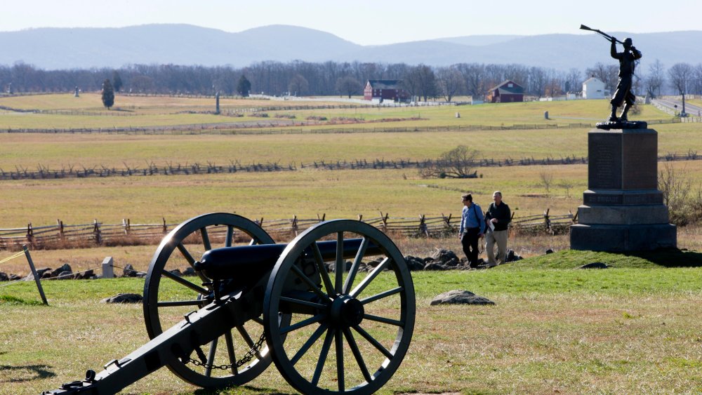 People visit the field of field Pickett's Charge, Monday, November 18, 2013, in Gettysburg, Pennsylvania.