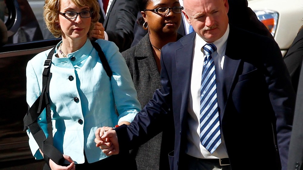 File Photo: Former Democratic Rep. Gabrielle Giffords, left, and her husband Mark Kelly leave after the sentencing of Jared Loughner, in back of U.S. District Court Thursday, Nov. 8, 2012, in Tucson, Ariz. Giffords and Kelly launched a political action...