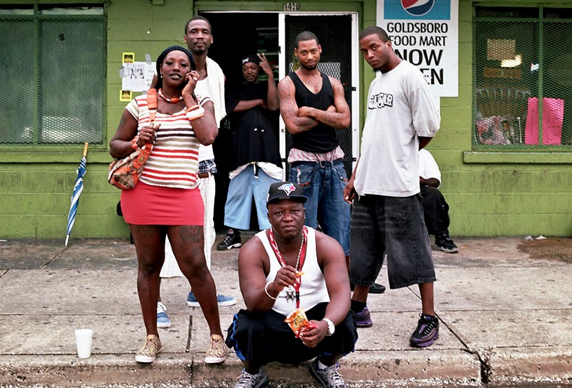 Goldsboro residents pose for a portrait in front of Goldsboro Food Mart, a popular local hangout, located on 13th Street, the town’s main artery, June, 2013.
