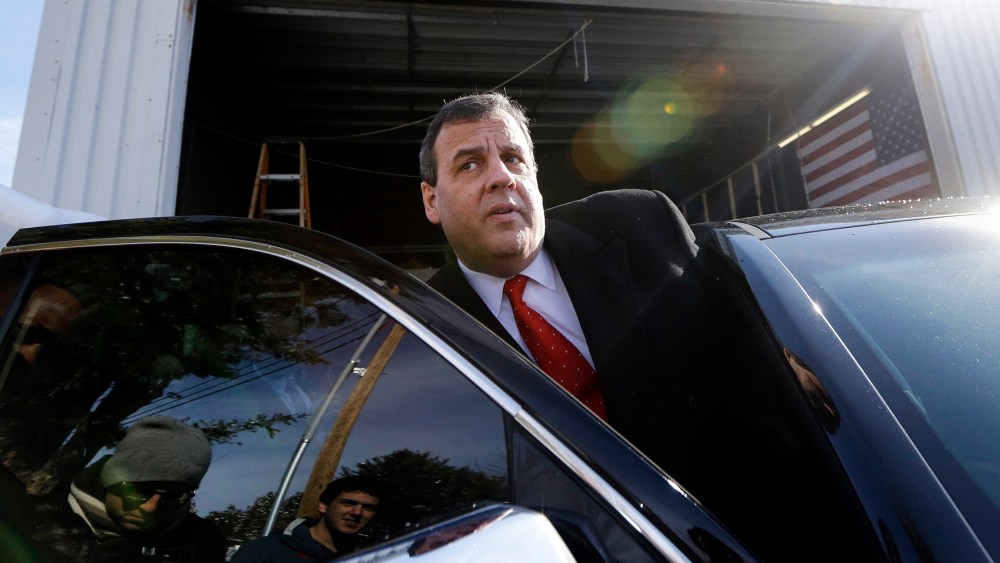 Republican presidential candidate, New Jersey Gov. Chris Christie gets in his car after a campaign event,, Feb. 6, 2016, in Bedford, N.H. (Photo by Elise Amendola/AP)