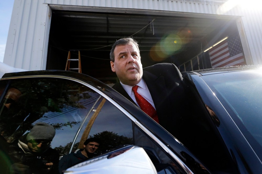Republican presidential candidate, New Jersey Gov. Chris Christie gets in his car after a campaign event,, Feb. 6, 2016, in Bedford, N.H. (Photo by Elise Amendola/AP)