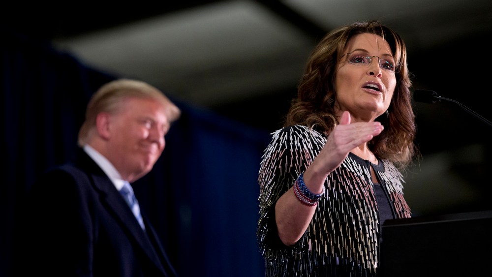 Former Alaska Gov. Sarah Palin, right, endorses Republican presidential candidate Donald Trump during a rally at the Iowa State University, Jan. 19, 2016, in Ames, Iowa. (Photo by Mary Altaffer/AP)