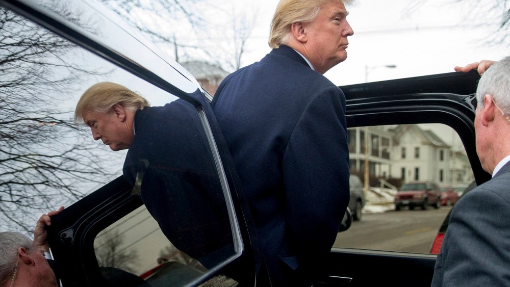 Republican presidential candidate Donald Trump departs after attending service at First Presbyterian Church in Muscatine, Iowa, Jan. 24, 2016. (Photo by Andrew Harnik/AP)