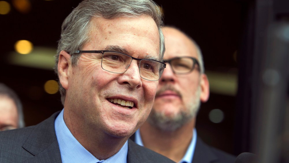 Former Florida Gov. Jeb Bush speaks with reporters after a discussion and question and answer session at the Mountain Shadows Community Center in Las Vegas on March 2, 2015.