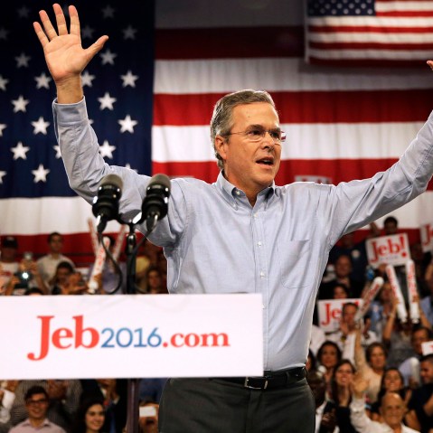 Former Florida Gov. Jeb Bush takes the stage as he formally join the race for president, June 15, 2015, at Miami Dade College in Miami. (Photo by David Goldman/AP)