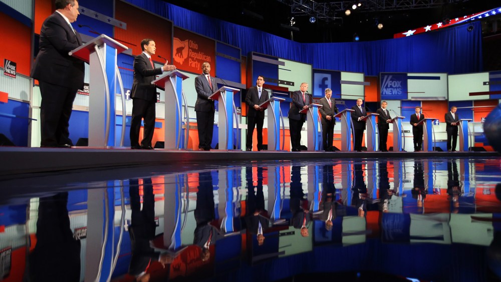 Republican presidential candidates take the stage for the first Republican presidential debate at the Quicken Loans Arena, Aug. 6, 2015, in Cleveland. (Photo by Andrew Harnik/AP)