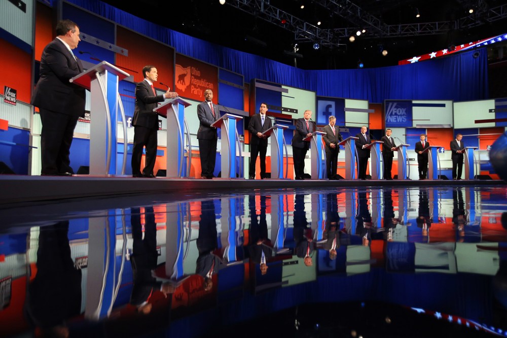 Republican presidential candidates take the stage for the first Republican presidential debate at the Quicken Loans Arena, Aug. 6, 2015, in Cleveland. (Photo by Andrew Harnik/AP)