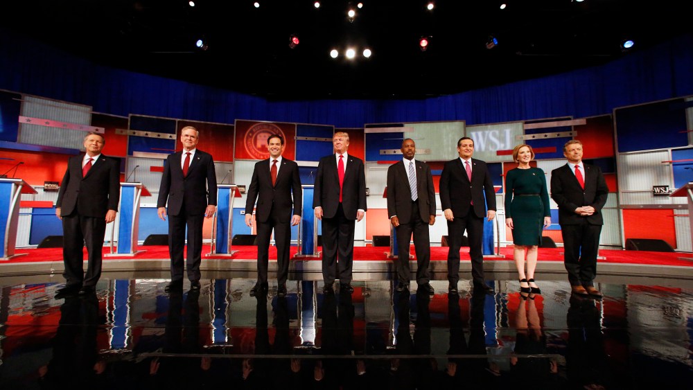 Republican presidential candidates John Kasich, Jeb Bush, Marco Rubio, Donald Trump, Ben Carson, Ted Cruz, Carly Fiorina and Rand Paul take the stage before the Republican presidential debate, Nov. 10, 2015, in Milwaukee. (Photo by Jeffrey Phelps/AP)