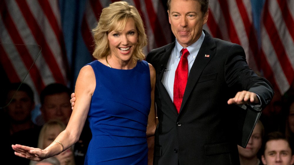 Sen. Rand Paul, R-Ky., joined by his wife Kelley Ashby, arrives to announce the start of his presidential campaign on April 7, 2015, in Louisville, Ky.