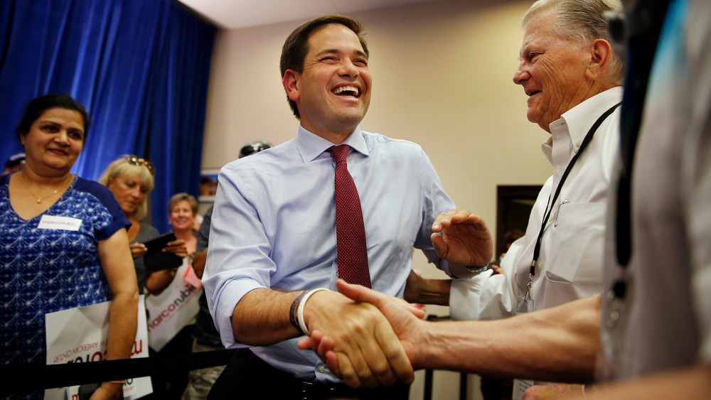 Republican presidential candidate, Sen. Marco Rubio, R-Fla., shakes hands at a campaign event, Oct. 8, 2015, in Las Vegas, Nev. (Photo by John Locher/AP)