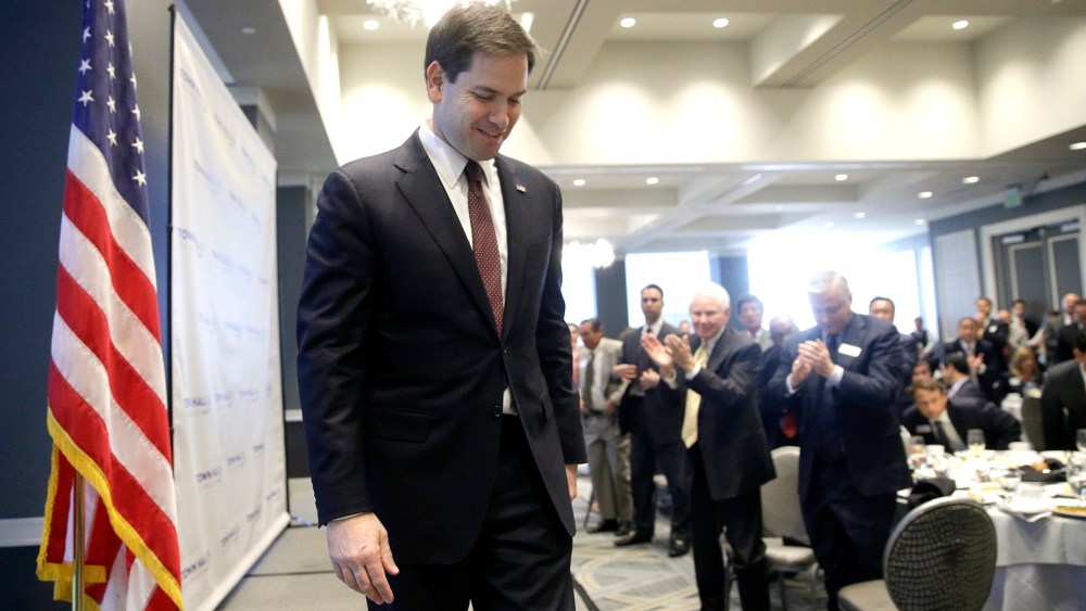 Republican presidential hopeful Sen. Marco Rubio, R-Fla., walks off the stage after speaking at an event organized on April 28, 2015, in Los Angeles.