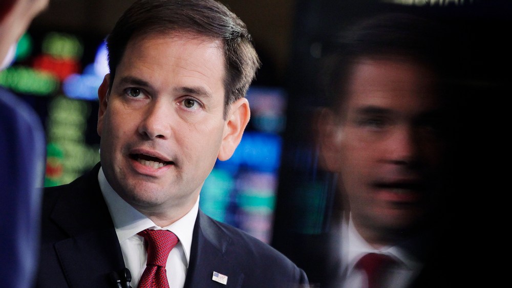 Republican presidential candidate, Sen. Marco Rubio, R-Fla., talks to CNBC correspondent John Harwood, left, during an interview at the New York Stock Exchange, Oct. 5, 2015. (Photo by Mark Lennihan/AP)
