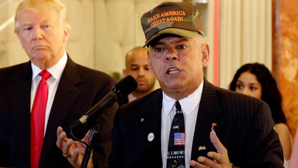 Republican presidential candidate Donald Trump listens at left as Al Baldasaro, a New Hampshire state representative, speaks during a news conference in New York, May 31, 2016. (Photo by Richard Drew/AP)