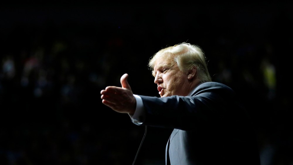 Republican presidential candidate, businessman Donald Trump addresses supporters at a campaign rally, Dec. 21, 2015, in Grand Rapids, Mich. (Photo by Carlos Osorio/AP)